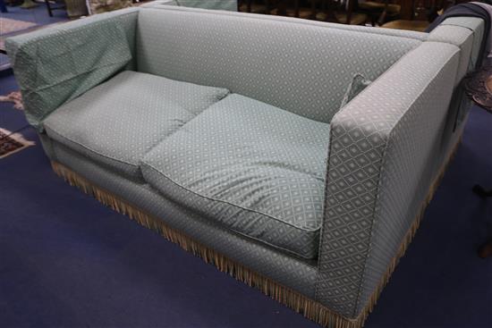 A pair of two-seat settees covered in blue/green fabric with loose cushions, 210 cm wide